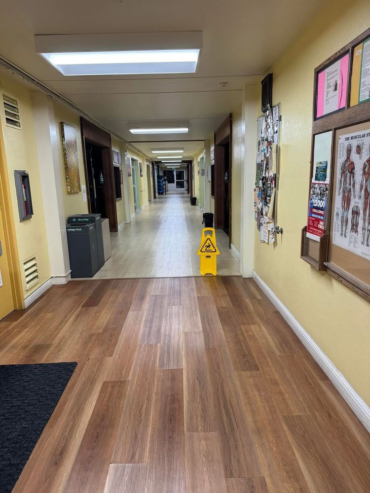 Commercial hallway with freshly cleaned wood floors
