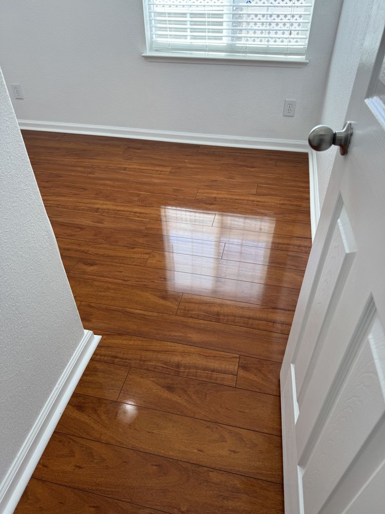 Glossy hardwood floor after move-out clean